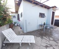 Casa com 154m², 2 dormitórios, 1 suíte, 3 vagas no bairro Sarandi em Porto Alegre