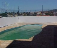 Casa com 450m², 4 dormitórios, 1 suíte, 6 vagas no bairro Santa Fé em Porto Alegre