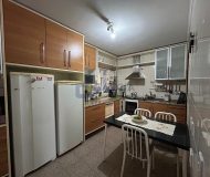 Casa com 350m², 4 dormitórios, 1 suíte, 2 vagas no bairro Jardim Planalto em Porto Alegre