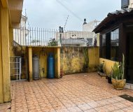 Casa com 350m², 4 dormitórios, 1 suíte, 2 vagas no bairro Jardim Planalto em Porto Alegre