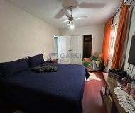 Casa com 350m², 4 dormitórios, 1 suíte, 2 vagas no bairro Jardim Planalto em Porto Alegre