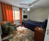 Casa com 350m², 4 dormitórios, 1 suíte, 2 vagas no bairro Jardim Planalto em Porto Alegre