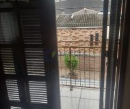 Casa com 100m², 3 dormitórios, 1 suíte, 2 vagas no bairro Costa e Silva em Porto Alegre
