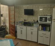 Casa com 100m², 3 dormitórios, 1 suíte, 2 vagas no bairro Costa e Silva em Porto Alegre