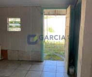 Casa com 346m², 4 dormitórios, 3 vagas no bairro Jardim Itu Sabará em Porto Alegre