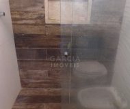 Casa com 230m², 3 dormitórios, 1 suíte, 2 vagas no bairro Jardim Barão do Cahy em Porto Alegre