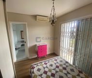 Casa com 394m², 4 dormitórios, 2 suítes, 4 vagas no bairro Jardim Itu em Porto Alegre