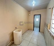 Casa com 60m², 2 dormitórios, 3 vagas no bairro Sarandi em Porto Alegre