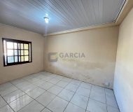 Casa com 60m², 2 dormitórios, 3 vagas no bairro Sarandi em Porto Alegre