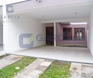 Casa com 178m², 3 dormitórios, 1 suíte, 4 vagas no bairro Sarandi em Porto Alegre