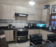 Casa com 360m², 7 dormitórios, 1 suíte, 2 vagas no bairro Jardim Itu em Porto Alegre