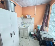 Casa com 390m², 5 dormitórios, 1 suíte, 4 vagas no bairro Sarandi em Porto Alegre