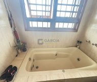 Casa com 390m², 5 dormitórios, 1 suíte, 4 vagas no bairro Sarandi em Porto Alegre