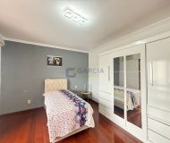 Casa com 390m², 5 dormitórios, 1 suíte, 4 vagas no bairro Sarandi em Porto Alegre