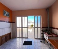 Casa com 161m², 3 dormitórios, 1 suíte, 3 vagas no bairro Jardim Ingá em Porto Alegre