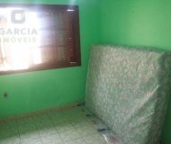 Casa com 159m², 2 dormitórios, 1 suíte, 2 vagas no bairro Parque da Matriz em Cachoeirinha