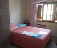 Casa com 159m², 2 dormitórios, 1 suíte, 2 vagas no bairro Parque da Matriz em Cachoeirinha