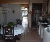 Casa com 159m², 2 dormitórios, 1 suíte, 2 vagas no bairro Parque da Matriz em Cachoeirinha