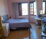 Casa com 460m², 5 dormitórios, 5 suítes, 2 vagas no bairro Sarandi em Porto Alegre