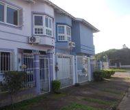 Casa com 148m², 3 dormitórios, 1 suíte, 2 vagas no bairro Santa Fe em Porto Alegre