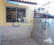 Casa com 363m², 3 dormitórios, 1 suíte, 2 vagas no bairro Partenon em Porto Alegre