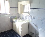 Casa com 363m², 3 dormitórios, 1 suíte, 2 vagas no bairro Partenon em Porto Alegre