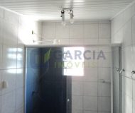 Casa com 363m², 3 dormitórios, 1 suíte, 2 vagas no bairro Partenon em Porto Alegre