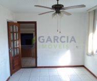 Casa com 363m², 3 dormitórios, 1 suíte, 2 vagas no bairro Partenon em Porto Alegre