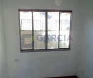 Casa com 363m², 3 dormitórios, 1 suíte, 2 vagas no bairro Partenon em Porto Alegre