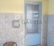 Casa com 363m², 3 dormitórios, 1 suíte, 2 vagas no bairro Partenon em Porto Alegre