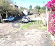 Casa com 363m², 3 dormitórios, 1 suíte, 2 vagas no bairro Partenon em Porto Alegre