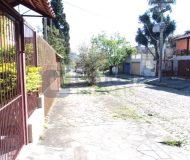 Casa com 363m², 3 dormitórios, 1 suíte, 2 vagas no bairro Partenon em Porto Alegre