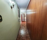 Casa com 450m², 3 dormitórios, 1 suíte, 6 vagas no bairro Jardim Lindóia em Porto Alegre
