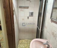 Casa com 450m², 3 dormitórios, 1 suíte, 6 vagas no bairro Jardim Lindóia em Porto Alegre