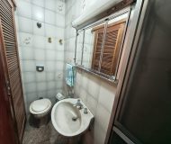 Casa com 450m², 3 dormitórios, 1 suíte, 6 vagas no bairro Jardim Lindóia em Porto Alegre