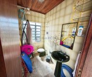 Casa com 450m², 3 dormitórios, 1 suíte, 6 vagas no bairro Jardim Lindóia em Porto Alegre