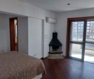 Apartamento com 82m², 1 dormitório, 1 suíte, 1 vaga no bairro Independência em Porto Alegre