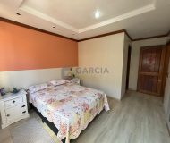 Casa com 125m², 3 dormitórios, 1 suíte, 3 vagas no bairro Sarandi em Porto Alegre