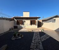 Casa com 125m², 3 dormitórios, 1 suíte, 3 vagas no bairro Sarandi em Porto Alegre