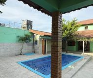 Casa com 189m², 2 dormitórios, 2 suítes, 5 vagas no bairro Sarandi em Porto Alegre