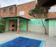 Casa com 189m², 2 dormitórios, 2 suítes, 5 vagas no bairro Sarandi em Porto Alegre