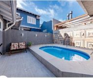 Casa com 144m², 3 dormitórios, 3 suítes, 2 vagas no bairro Sarandi em Porto Alegre