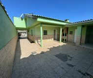 Casa com 103m², 2 dormitórios, 5 vagas no bairro Sarandi em Porto Alegre