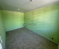 Casa com 103m², 2 dormitórios, 5 vagas no bairro Sarandi em Porto Alegre
