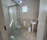 Casa com 99m², 2 dormitórios, 4 vagas no bairro Parque Minuano em Porto Alegre
