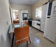 Casa com 99m², 2 dormitórios, 4 vagas no bairro Parque Minuano em Porto Alegre