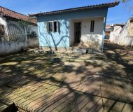 Casa com 99m², 2 dormitórios, 4 vagas no bairro Parque Minuano em Porto Alegre