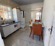 Casa com 99m², 2 dormitórios, 4 vagas no bairro Parque Minuano em Porto Alegre