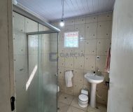 Casa com 99m², 2 dormitórios, 4 vagas no bairro Parque Minuano em Porto Alegre