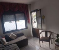 Casa com 250m², 3 dormitórios, 4 vagas no bairro Parque Minuano em Porto Alegre